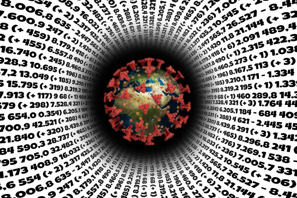 COVID spike protein surrounded by data and numbers.